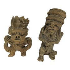 Coppia di antiche sculture in