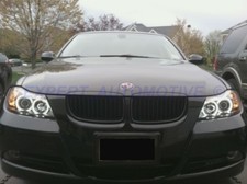 FARI BMW SERIE 3  E90 E91 ANGEL EYES A LED  CIGLIO SUPERIORE CROMO O NERI