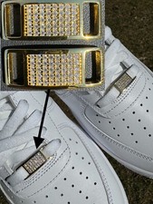 Chiusure in pizzo oro