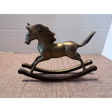 Statuina cavallo a dondolo