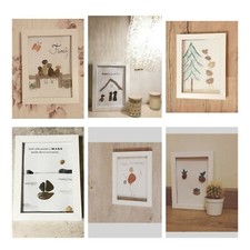 quadretti fatti a mano con ciottoli e materiale di recupero