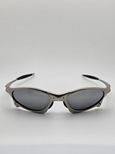 Occhiali da sole Oakley Penny montatura argento lenti polarizzate cromate a specchio