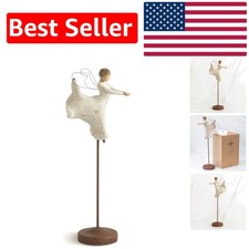 Angelo danzante con simboli