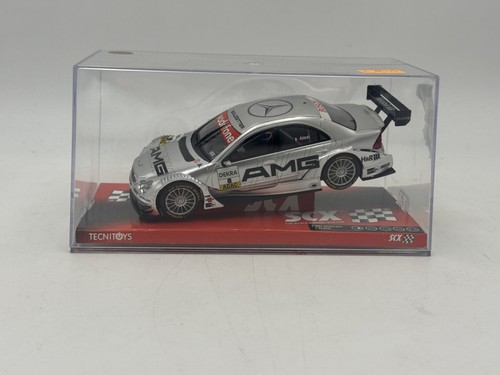 Slot car scx - slot, 1/32
