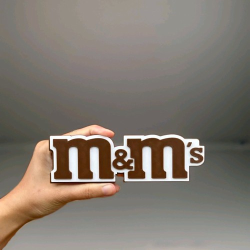 Logo insegna colorata arte - m&m,