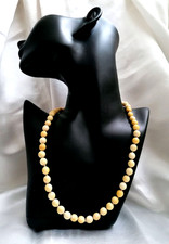 ANTICA PREGIATA COLLANA GIROCOLLO REGOLARE AVANA, EPOCA 1930 CIRCA.