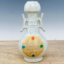 Delicato vaso incrostazione