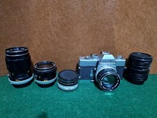Minolta SRT101 con serie di obiettivi e accessori