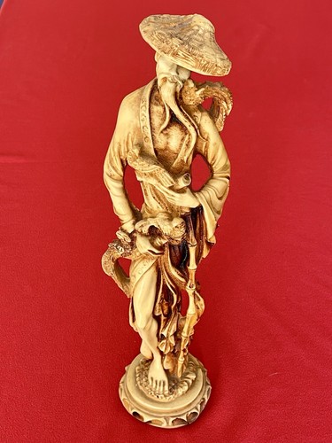 Scultura uomo cinese orientale