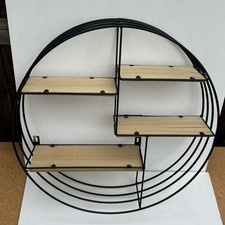 Struttura rotonda in metallo con ripiano a muro in legno