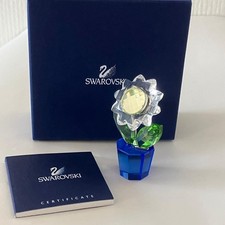 Statuina margherita fiori