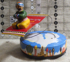 antico giocattolo di latta KO