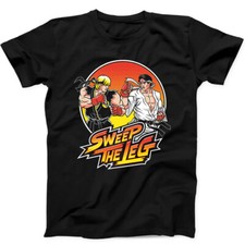 T-shirt nera Sweep The Leg