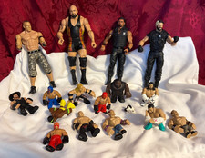 WWE - Four 7" Wrestlers and 12