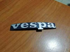 TARGHETTA SCUDO ANTERIORE 2 PERNI PIAGGIO VESPA PX ARCOBALENO 1197601 NUOVA