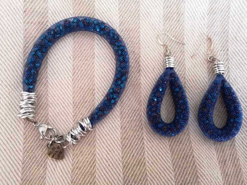 Bracciale orecchini con - e,