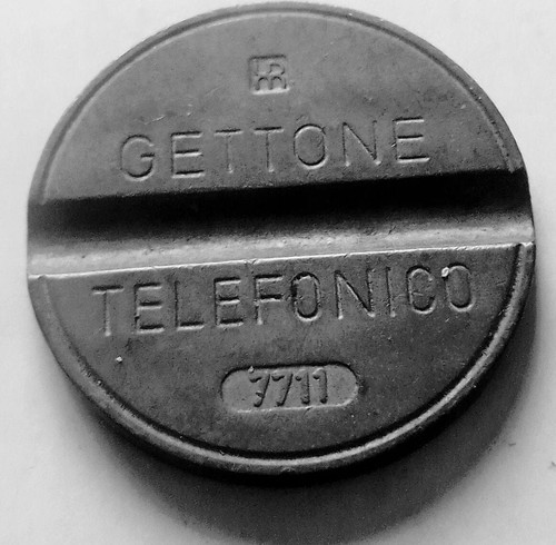 Gettone telefonico raro 7711