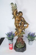 Statua putti cherubino patina