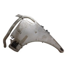 Bottiglia e motore lavatrice