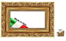 Cornice in oro in legno ad