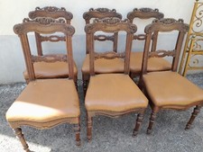 GRUPPO 6 SEDIE UMBERTINE IN NOCE CON INTAGLI - SEDUTA IN PELLE - 1920 EMILIA