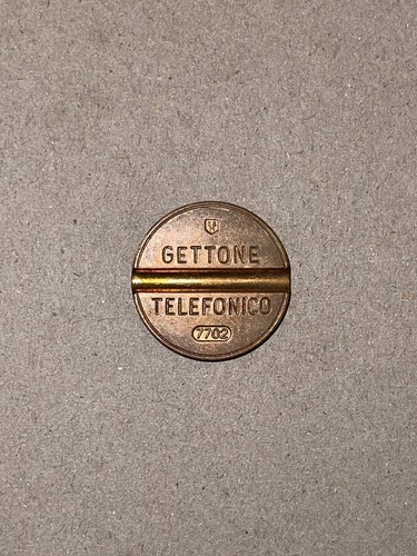 Gettone telefonico 7702 esm - gettone, esm 