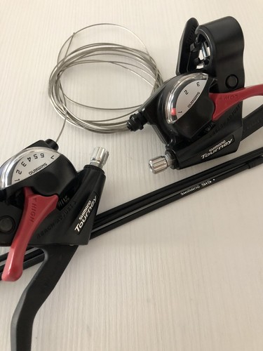 Comando shimano tourney vel - 21,