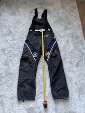 Motoslitta Polaris. Pantaloni