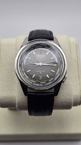 Seiko world time - world,