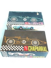 2 AMT plastic model kit empty boxes: McLaren Elva and Chaparral