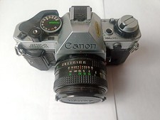 Canon AE-1 PROGRAM con 50 mm + Filtri