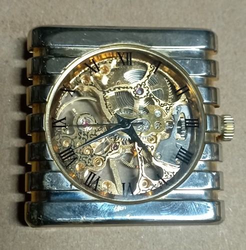 Orologio scheletrato carica - orologio,