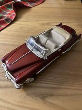 Road Legends 1969 Cadillac 80 Coupe Deville - rosso metallizato scala 1/18