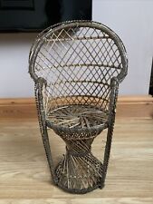 Sedia vintage in vimini pavone