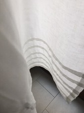 Tende coppia in tessuto colore naturale con fiocco fisso e piccole pieghe