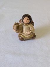 THUN ANGELO CON PACCO REGALO