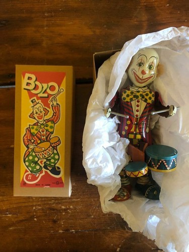 Clown playing drums tin - tin, litho
