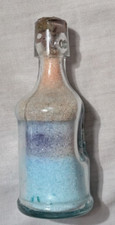 BOTTIGLIA DI VETRO RIEMPITA DI