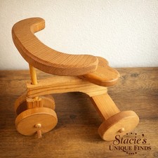 Triciclo giocattolo in legno