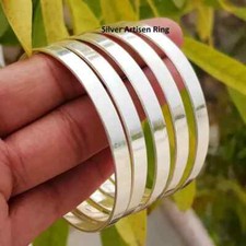 Set di 5 braccialetti in