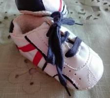 scarpine neonato numero 18 marca brums  colore bianco/blu mai usate