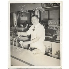Man Pouring Soda Pop Pick