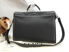 Borsa a mano reversibile Fendi Peekaboo nera con borchie sedano 15,9 * 12,5 * 6,6 pollici