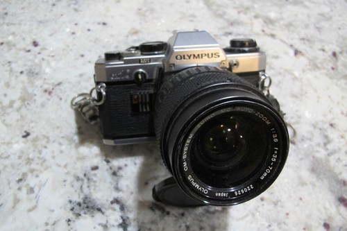 Olympus reflex mm con - olympus,