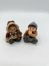 Coppia statuine bambina - di,