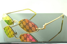 Gucci GG1604S 004 occhiali da sole unisex geometrici oro con lenti logo specchio rosa