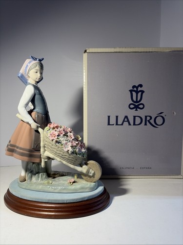 Lladro barrow of - a, blossoms
