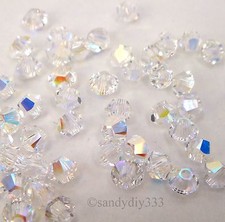 144x SWAROVSKI 5328 CRISTALLO TRASPARENTE AB 3mm CRYSTAL XILION BICONO BEAD