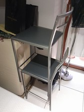 Sedie sgabello in metallo e sedile in pelle