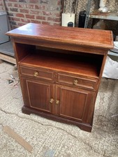 Armadio in legno ante cassetti